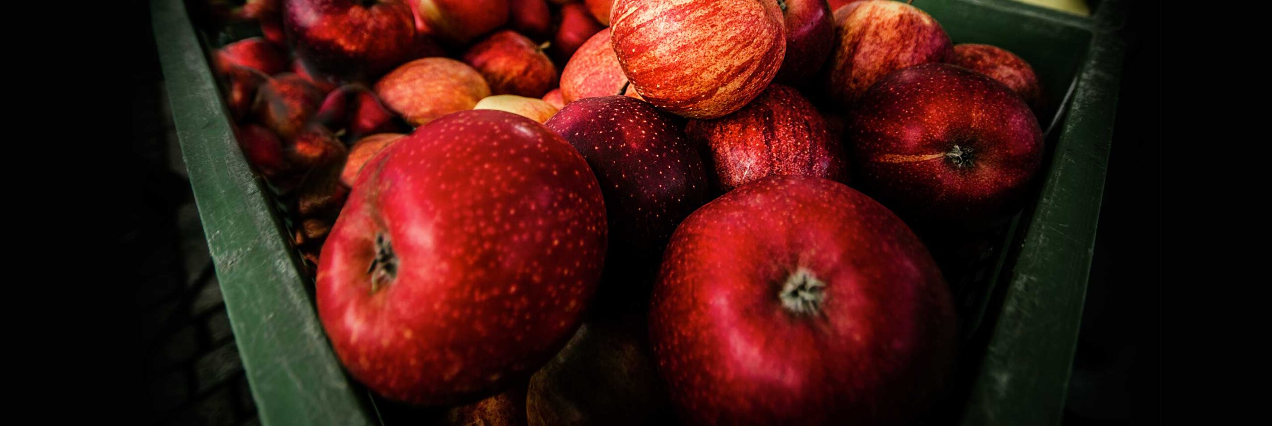 crate full of red apples